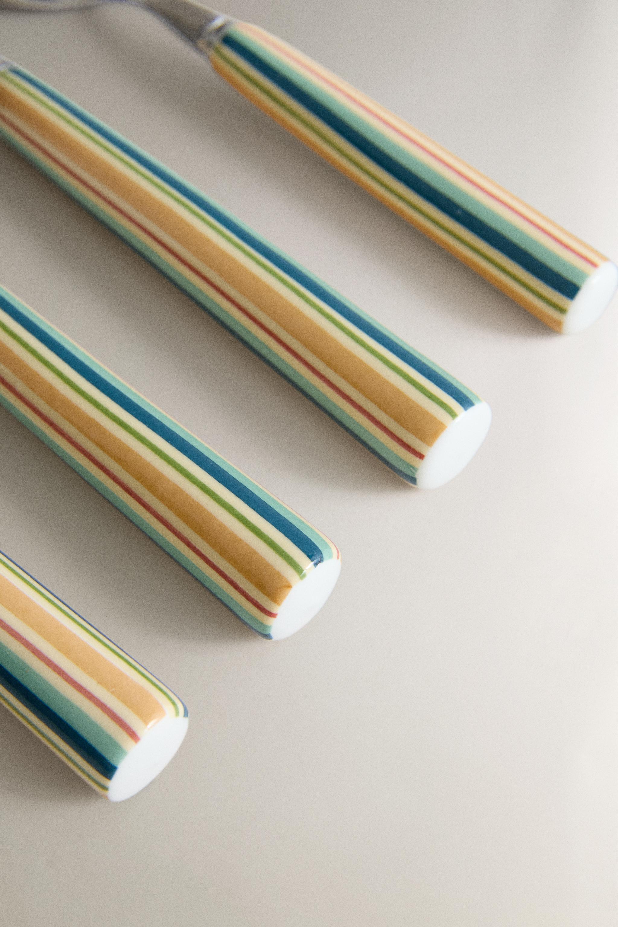 ENSEMBLE COUVERTS MANCHE CÉRAMIQUE (LOT DE 4)